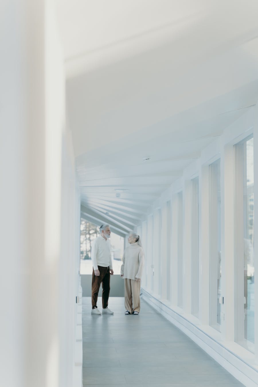 Elderly couple walking together while traveling